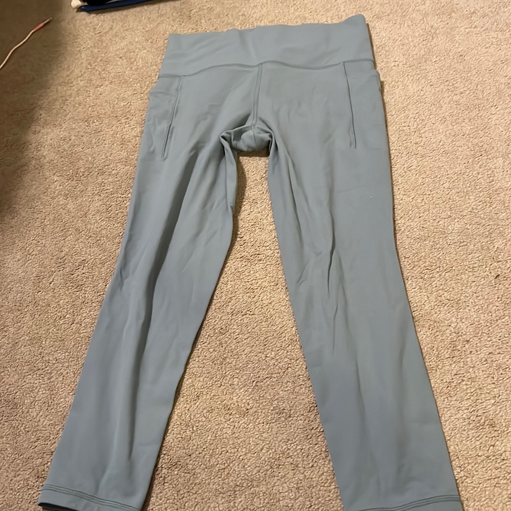 High rise salutation stash pocket 7/8 tights